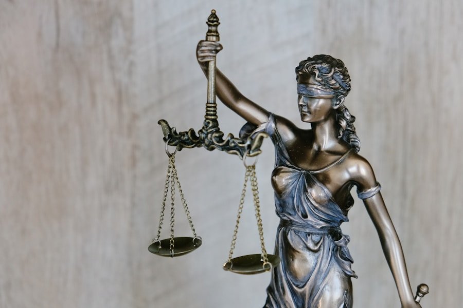 Scales of justice beside legal books
